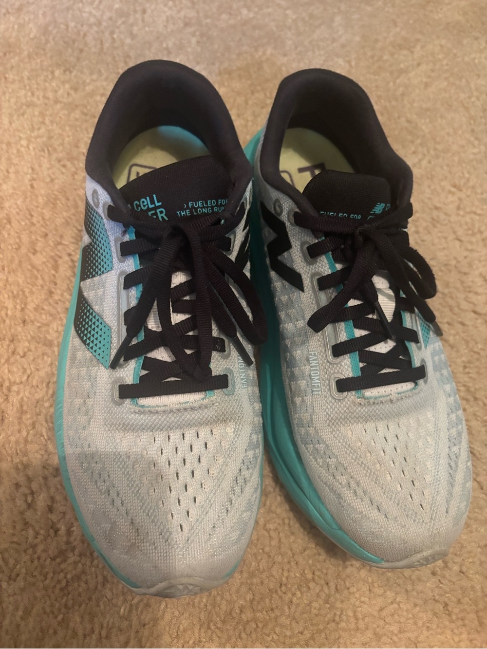New Balance Women's Running Shoes in Light Blue and Teal Accents